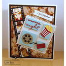 Card with movie-themed stamps and text 'Let's have a movie night' on a popcorn background.