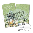 Two green notebooks with floral designs and text on a white background