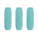 Three skeins of turquoise yarn on a white background