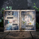 Artistic book with text and images on a wooden surface