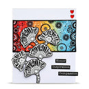 Decorative card with floral designs and motivational text on a colorful abstract background
