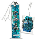 Decorative bookmarks with blue and black designs on a white background