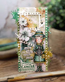 Decorative card with a person holding a camera, flowers, and text on a wooden surface.