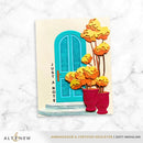 Colorful card with a blue door and orange flowers on a marble background