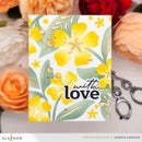 Card with yellow flowers and 'with love' text, surrounded by flowers and jewelry.