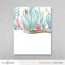 Underwater scene card with fish and coral on a gray background, featuring the brand 'Altenew'.