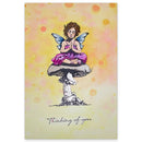 Illustration of a fairy sitting on a mushroom with a colorful polka dot background and 'Thinking of you' text.