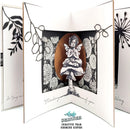 Open card with black and white floral design and a fairy illustration, featuring the Andy Skinner Creative Team logo.
