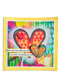 Colorful card with heart design and motivational quote on a white background