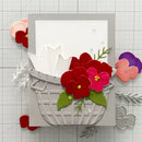 Card with flower basket design featuring red, pink, and purple flowers on a grid background