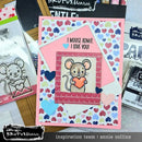 Card with a mouse holding a heart and text 'I mouse admit, I love you!' surrounded by craft supplies.