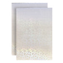 Two white greeting cards with a subtle pattern on a white background