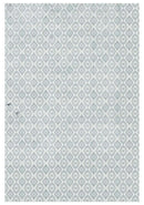 Patterned rug with geometric design on a light gray background