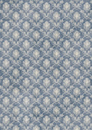 Patterned fabric with a blue and white design on a blue background