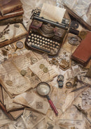 Vintage typewriter surrounded by old books, papers, and coins on a textured surface
