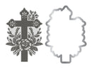 Decorative metal cutting dies with floral cross design on a white background