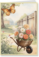 Greeting card with a wheelbarrow full of flowers and a butterfly in a garden setting.