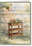 Greeting card with a wooden plant stand, flowers, and a butterfly against a wooden panel background.