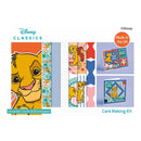 Card making kit with Disney Classics branding featuring cartoon characters and colorful designs.