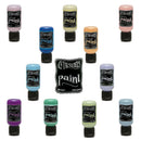 Set of Dylusions paint bottles in various colors on a white background