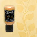 Bottle of Dylusions Peach Parfait paint against a yellow leaf-patterned background