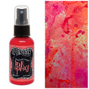 Dylusions ink spray bottle with a colorful splatter background