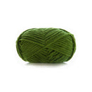 Green skein of yarn on a white background