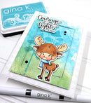Card with a moose illustration and 'Courage will light the way' text, featuring Gina K. Designs products.