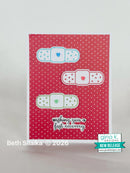 Card with band-aids and text 'Wishing you a fast recovery' on a red polka dot background, with 'gina k. Designs' branding.