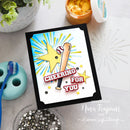 Card with a baseball bat and star design on a table with crafting supplies.