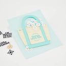 Card with a small bag and flowers on a light blue background