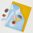 Card with a blue jacket design featuring sports-themed stickers on a yellow background