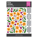 Color layering stencils with floral design and gray patterns on a white background