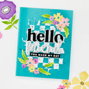 Turquoise notebook with floral designs and text on a white background