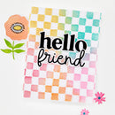Colorful checkered blanket with 'hello friend' text and decorative elements on a white background