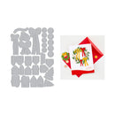 A holiday card crafting kit shown on a white background, featuring a set of gray metal die-cut shapes on the left and a finished example card with a red envelope on the right. The example card displays a colorful wreath with red and yellow ribbons, green leaves, and gold ornaments, with the word 'JOY' printed at the bottom.