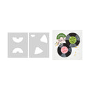 Two square gray stencils with white cutout shapes on the left, and a printed craft sheet on the right featuring three vinyl record graphics in black, green, and pink with decorative text and small gold dots, shown on a white background.