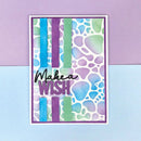 Colorful card with 'Make a Wish' text on a purple and blue background