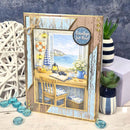 Decorative greeting card with a coastal scene and 'Goodbye for Now!' message, surrounded by decorative items.