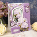 Decorative greeting card with floral design and text, surrounded by flowers on a blue background.