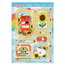 Colorful scrapbooking kit with various designs on a white background
