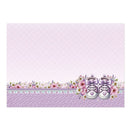 Pair of baby shoes with flowers on a light purple background