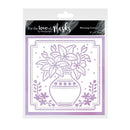 Packaging of a floral design mask with 'For the Love of Masks' branding.
