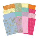 Collection of colorful patterned paper sheets on a white background