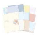 Collection of pastel-colored stationery items on a white background