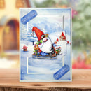 Christmas card with Santa Claus and gnomes on a sleigh, surrounded by snow and trees.
