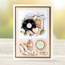 Greeting card with vinyl record, flowers, high heels, and other decorative elements on a textured surface.