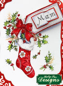 Decorative Christmas card with a red stocking, holly, and a 'Mam' tag, featuring Holly Jive Designs logo.
