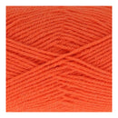 Close-up of bright orange yarn on a white background