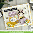 Card with a bee character and honey jar on a wooden surface, featuring the text 'You're sweet as honey'.